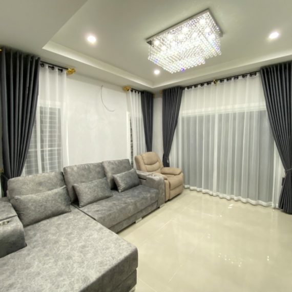 made to measure blackout curtains with linen chiffon with sofa upholstery by curtains express dubai